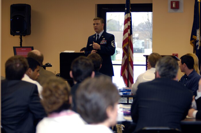 Master Sgt. Timothy Smith speaks to an audience at the Charleston Metro Chamber of Commerce March 11. The conference was one of many to help raise funds within the community to support programs such as workforce development, workforce housing and the military policy council. Sergeant Smith recently returned from a deployment to the Middle East and spoke about the community support organized by the chamber to boost the morale of deployed troops. Sergeant Smith is the 437th Logistics Readiness Squadron first sergeant. (U.S. Air Force photo/Airman 1st Class Lauren Main)
