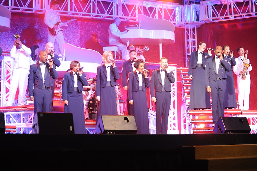 ABILENE, Texas – Air Force Tops in Blue performers sing The Air Force Song March 9 as their final performance of the night at the Abilene Civic Center here. Tops in Blue is an all-active duty Air Force special unit made up of talented amateur performers selected for their entertainment abilities. Each year, thousands compete in base talent contests and the most talented move on to higher levels of competition. The result is an elite group composed of 35 of the most talented vocalists, musicians, dancers, comedians, magicians, and dramatists worldwide. Known as the Air Forces’ Expeditionary Entertainers; the group’s main mission is to perform for military personnel and their families throughout the world. The enormous popularity of the group has also made them America’s goodwill ambassadors around the globe. For more information, logon to the Tops in Blue website at www.topsinblue.com. (U.S Air Force photo/ Airman 1st Class Shannon Hall)
