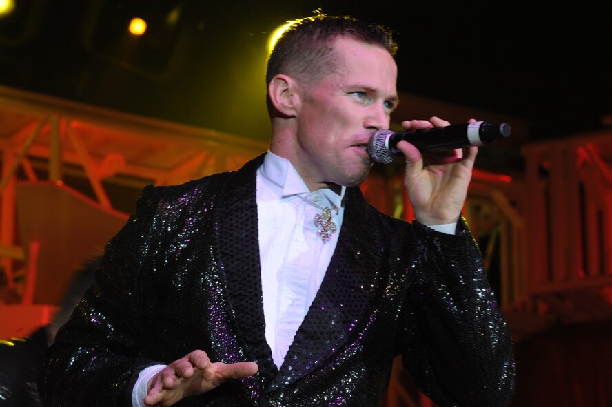 ABILENE, Texas – Air Force Tops in Blue vocalist Staff Sgt. Timothy Womble, 437th Maintenance Squadron, Charleston Air Force Base, S.C., performs for Dyess Airmen, their families and Abilene residents March 9 at the Abilene Civic Center here. Tops in Blue is an all-active duty Air Force special unit made up of talented amateur performers selected for their entertainment abilities. Each year, thousands compete in base talent contests and the most talented move on to higher levels of competition. The result is an elite group composed of 35 of the most talented vocalists, musicians, dancers, comedians, magicians, and dramatists worldwide. Known as the Air Forces’ Expeditionary Entertainers; the group’s main mission is to perform for military personnel and their families throughout the world. The enormous popularity of the group has also made them America’s goodwill ambassadors around the globe. For more information, logon to the Tops in Blue website at www.topsinblue.com. (U.S Air Force photo/ Airman 1st Class Shannon Hall)