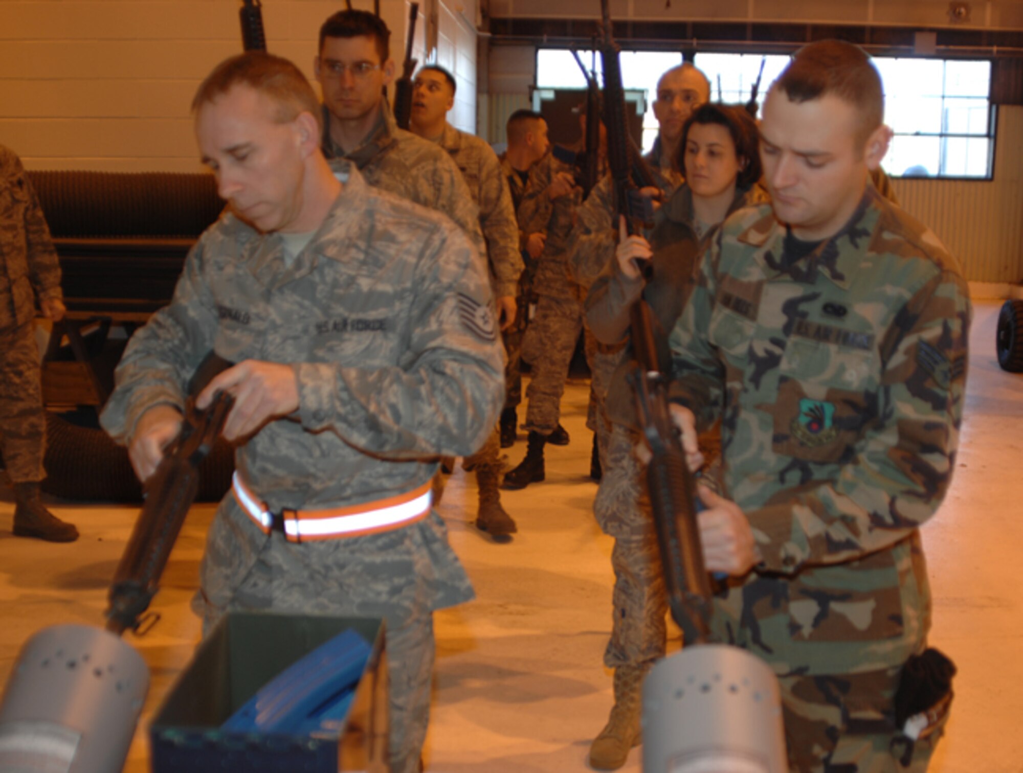 GRISSOM AIR RESERVE BASE, Ind., -- Airmen from the 434th Air Refueling Wing wait their turn to practice clearing an M-16.  (U.S. Air Force photo/Senior Airman Carl Berry)