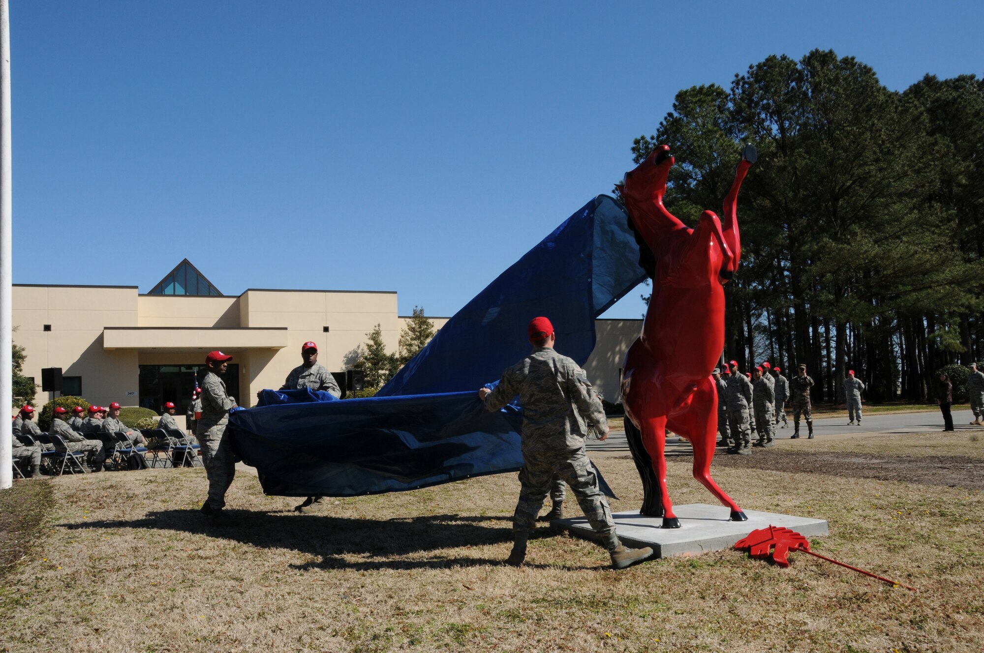 Charging Charlie, mascot for the 567th Red Horse Squadron was unveiled in March during the squadron's ribbon cutting ceremony for their new building.  In keeping with tradition, Charlie, the Red Horse mascot stands proudly in front of every Red Horse squadron in the Air Force. (U.S. Air Force photo by TSgt. Scotty Sweatt, 916ARW/PA)