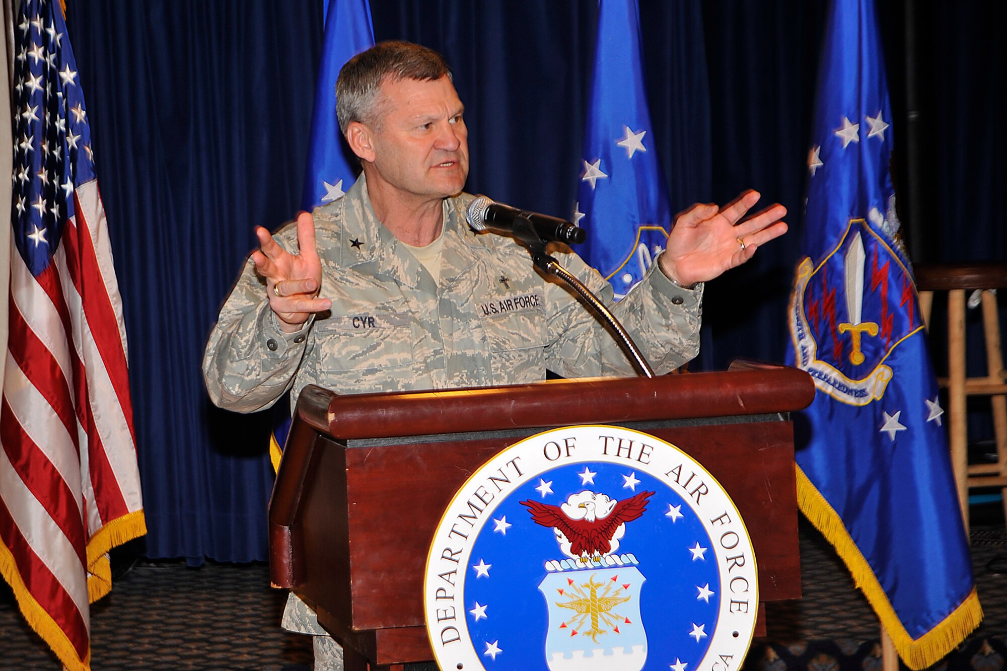 PETERSON AIR FORCE BASE, Colo. -- Chaplain (Brig. Gen.) David Cyr, Air Force deputy chief of chaplains, talks about the importance of prayer during the 2010 National Prayer Luncheon here at The Club. General Cyr was the keynote speaker at the luncheon, which included an introduction by Lt. Col. Randall Kitchens, 21st Space Wing chaplain. (U.S. Air Force photo/Dennis Howk)