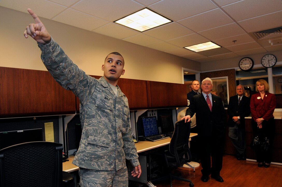 Senior Airman Samuel Avila, an aeromedical technician with the 779th Aerospace Medicine Squadron, briefs the mission operations of the Aeromedical Staging Facility to the former chief master sergeants of the Air Force tour on Joint Base Andrews, Md., March 10, 2010. Five former chief master sergeants of the Air Forces and their spouses, along with Chief Master Sgt. James A. Roy, attended the tour. After the tour, Chief Roy continued on to do an enlisted call for Team Andrews at the base theater. (U.S. Air Force photo by Staff Sgt. Renae L. Saylock)