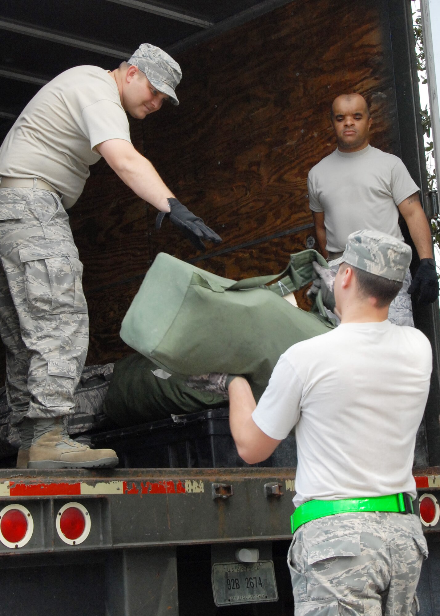 Deployment bags are loaded in the back of a transfer truck March 11 for the members of the 728th Air Control Squadron prior to their deployment from Eglin Air Force Base, Fla.  The bags are loaded by squadron members being left behind on this rotation.  The 728th sent almost half their squadron in support of Operation Iraqi Freedom, some of whom had just returned from deployment in September 2009.  (U.S. Air Force photo/Samuel King Jr.)