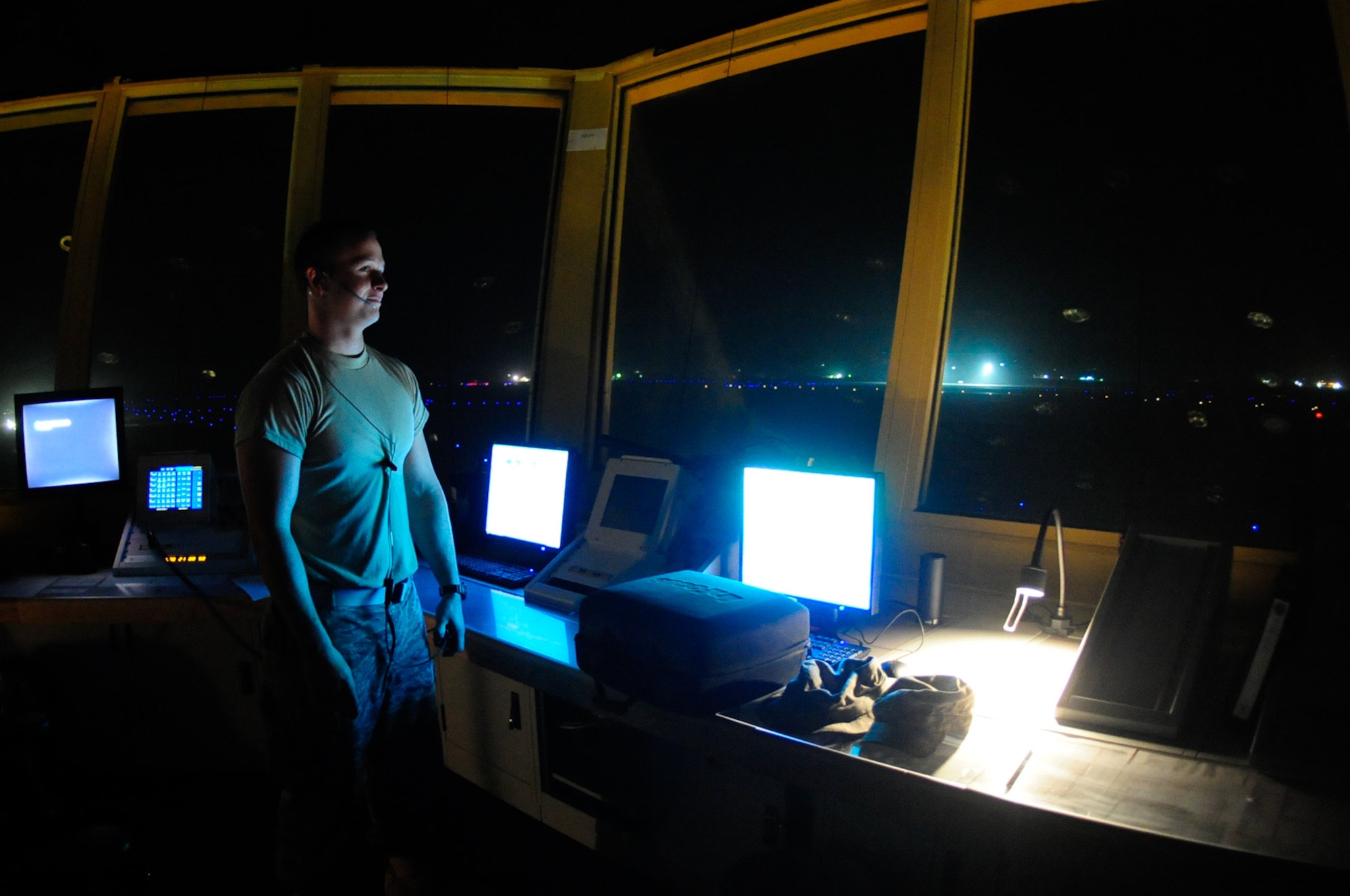 U.S. Air Force Senior Airman Michael Coyne, 407 Expeditionary Operations
Support Squadron, deployed from 19th Operational Support Squadron, Little
Rock, Ark., air traffic controller, begins transmission for the first time
from the new air traffic control tower at Ali Base, Iraq, March 12, 2010.
The new ATC tower marks the beginning of a new era of modernization here at
Ali Base. (U.S. Air Force Photo by Senior Master Sgt. Elizabeth
Gilbert/released)
