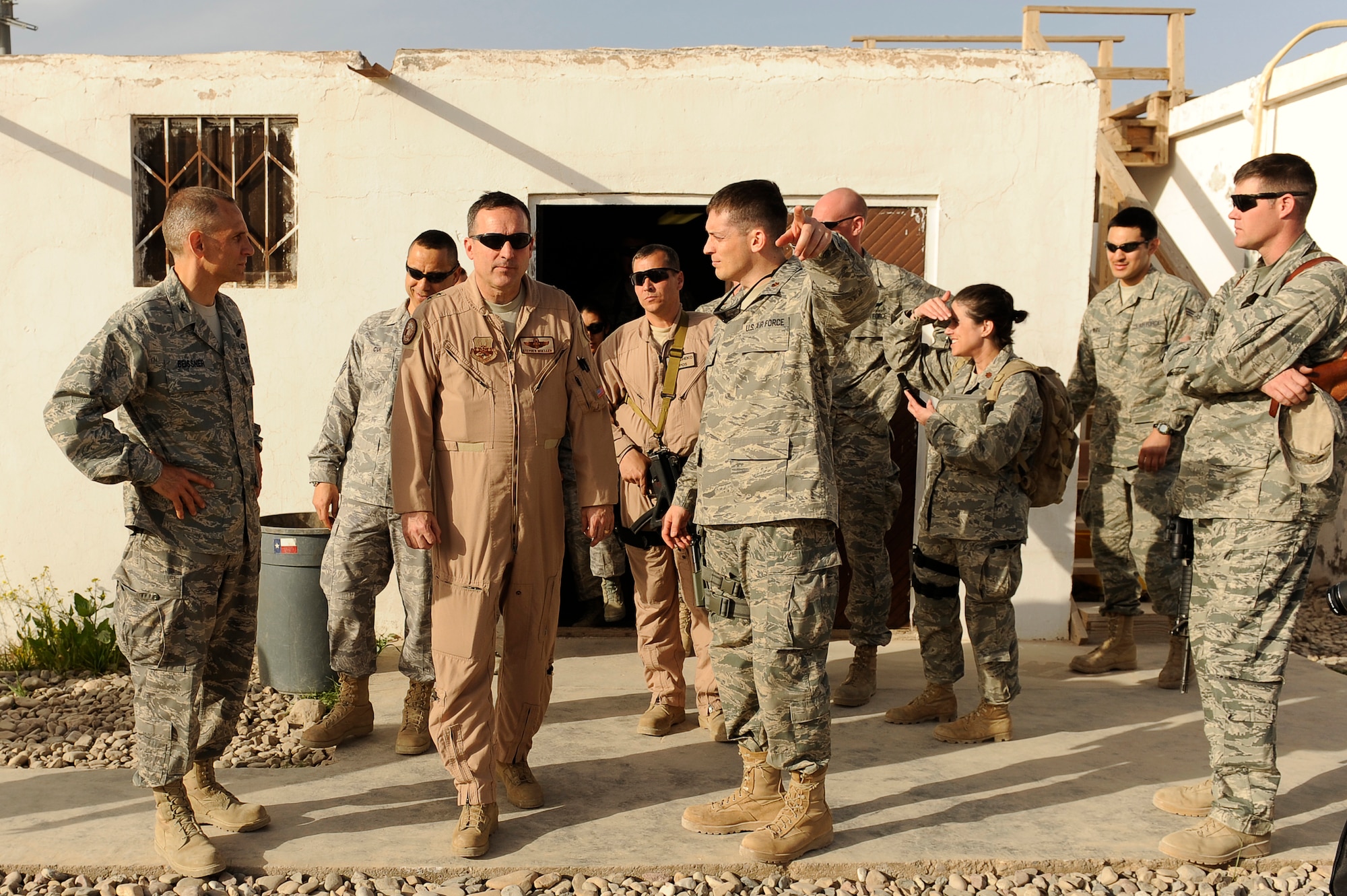 U.S. Air Force Maj. Gen. Stephen Mueller (center), director, Air Component Coordination Element, Air Force Central Command, tours Forward Operating Base Tarin Kowt, Afghanistan March 14, 2010. (U.S. Air Force photo by/ Tech. Sgt. Jeromy K. Cross/released)