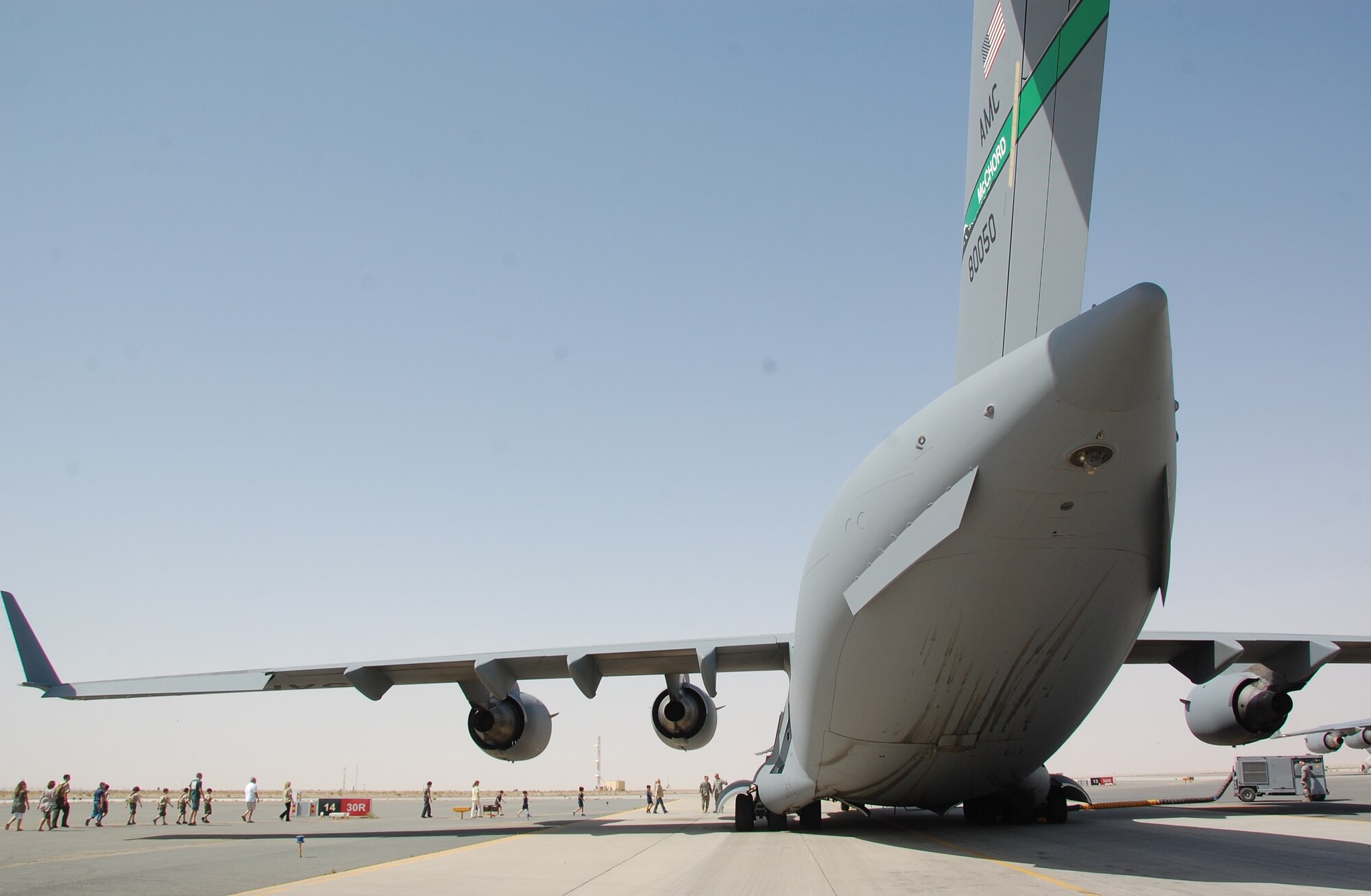 Local Boy Scouts and Cub Scouts tour a C-17 March 13, 2010 at an air base in Southwest Asia. During the Scouts' visit with the 386th Air Expeditionary Wing, the boys visited with EOD, Fire Department and Military Working Dog Airmen; walked through C-130 and C-17 static displays on the flightline and ate lunch at the dining facility. (U.S. Air Force Staff Sgt. Lindsey Maurice/Released)