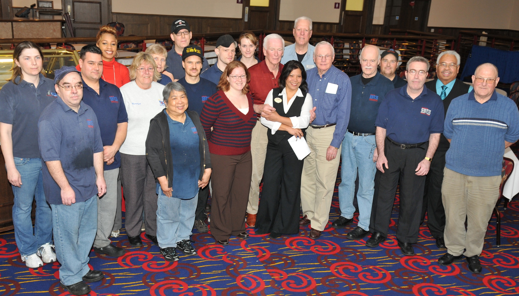 RAF MILDENHALL, England – Astronauts Neil Armstrong (front, fourth from right) and Gene Cernan (left of Mr. Armstrong), and former “Good Morning America” host David Hartman (behind the two) pose with 100th Force Support Squadron Galaxy Club employees March 12 after a breakfast in their honor at the Galaxy Club. The previous night, the gentlemen teamed with Apollo 13 Commander Jim Lovell, last Air Force pilot ace Steve Ritchie, and SR-71 Chief Test Pilot Bob Gilliland, for the “Legends of Aerospace: The Impossible Is Possible” tour. (U.S. Air Force photo/Tech. Sgt. Kevin Wallace)