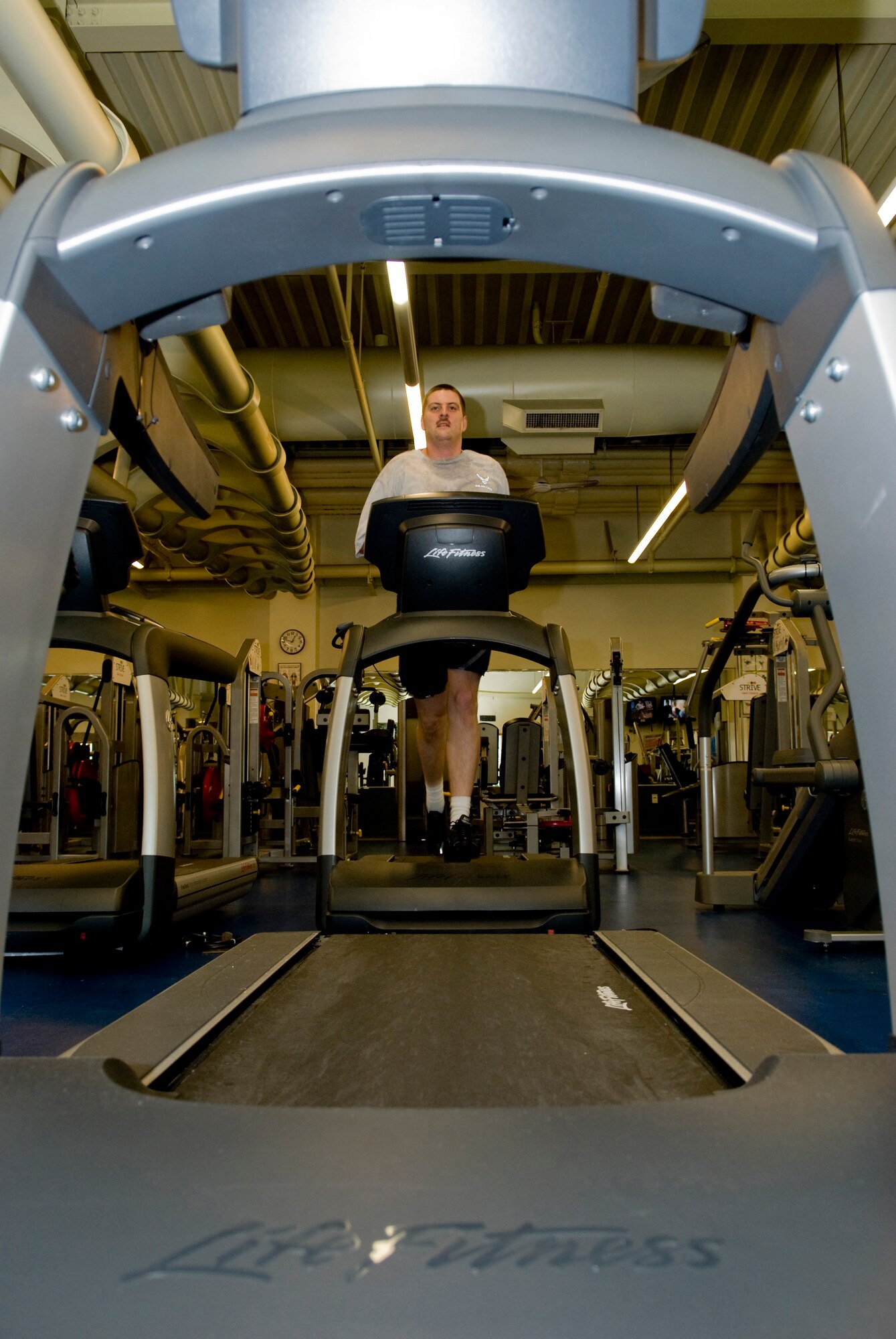 KUNSAN AIR BASE, Republic of Korea-Tech. Sgt. Robert Soto, 8th Maintenance Squadron, runs on the treadmill. Running is a high impact exercise and having the proper shoes and running surfaces is crucial to avoiding injuries. (U.S. Air Force photo/Senior Airman Jonathan Steffen)