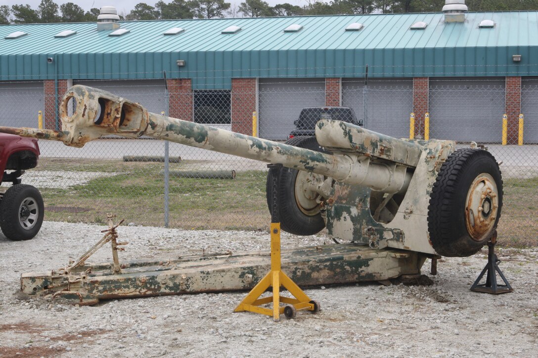 A Soviet 122mm howitzer D-30 sits at the Auto Body Hobby Shop after being removed from its abandoned spot in the woods of SR-10 range, March 16. With repairs already started on the cannon, both service members and civilians are welcome to participate in the refurbishment, which will eventually lead to its dedication as an Iraqi War memorial.