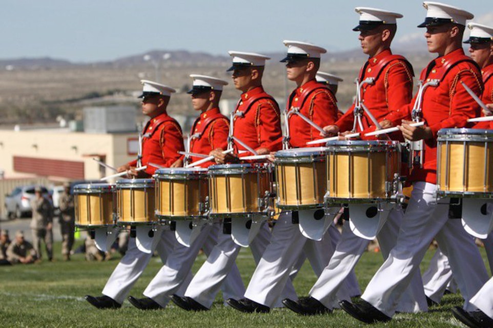 Marines with the United States Marine Drum and Bugle Corps, known as the “Commandant’s Own,” from Marine Barracks8th and I in Washington, D.C., perform during the annual Battle Colors Ceremony at the Combat Center's  Lance Cpl. Torrey L. Gray Field March 16.