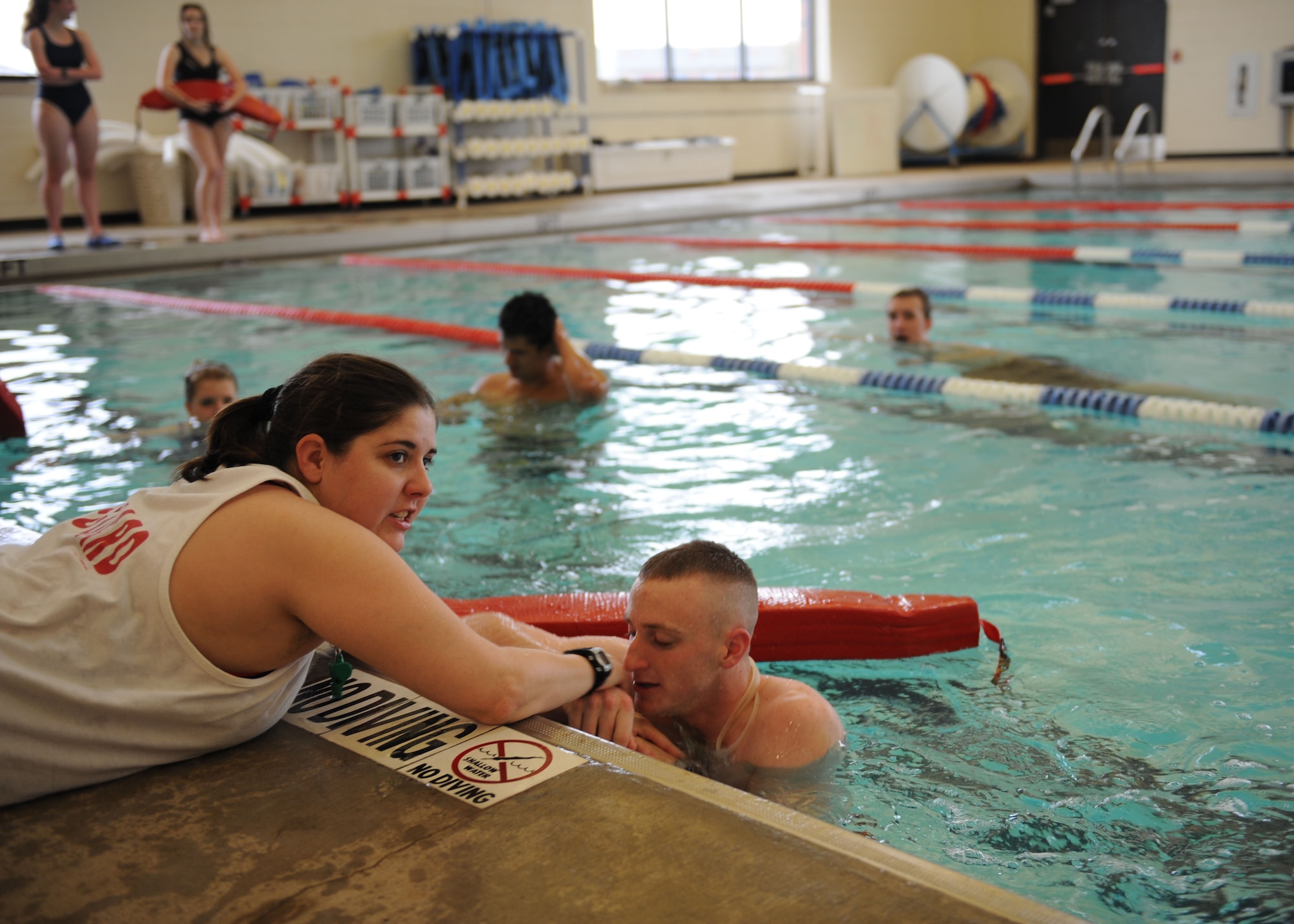 DYESS AIR FORCE BASE, Texas – Amanda Martin, Dyess Fitness Center aquatics director, teaches a lifeguard class here, March 16. Students are trained on CPR, AED, proper entries into the pool and how to rescue victims. (U.S. Air Force photo/ Airman 1st Class Brittney Prescott)