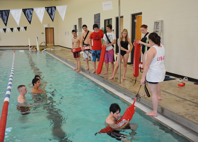 DYESS AIR FORCE BASE, Texas – Amanda Martin, Dyess Fitness Center aquatics director, teaches a lifeguard class here, March 16. Students are trained on CPR, AED, proper entries into the pool and how to rescue victims. (U.S. Air Force photo/ Airman 1st Class Brittney Prescott)