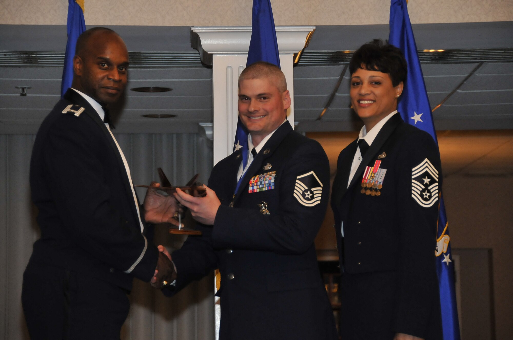 Squadron of the Year: 11th Security Forces Squadron. Master Sgt. Bruce Stohlman, Joint Visitors' Center superintendent, was on hand to accept the award on behalf of the squadron. (U.S. Air Force photo by Senior Airman Marleah Miller)