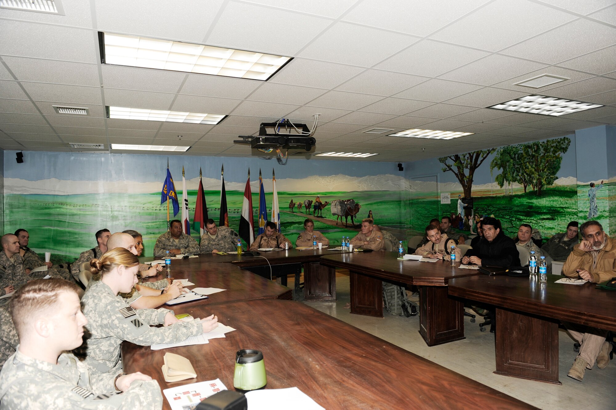 Afghan National Army Air Corps and coalition forces attend a meeting March 6, 2010, at the Craig Joint Theater Hospital at Bagram Airfield, Afghanistan. During this meeting, Afghan and coalition forces discussed the evolution of the medical evacuation mission in Afghanistan. (U.S. Air Force photo/Tech. Sgt. Jeromy K. Cross)