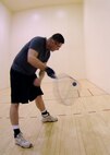 MINOT AIR FORCE BASE, N.D. – Tech. Sgt. Bud Snyder, 5th Medical Operations Squadron public health craftsman, practices a backhand return at the McAdoo Sports and Fitness Center on base March 12. The fitness center held a free racquetball clinic, which included rules, terminology and techniques. (U.S. Air Force photo by Senior Airman Sharida Jackson)