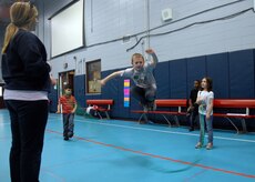 Nathan Mixon warms up for a jump rope activity with friends which will be held at a later date at the Youth Programs Center March 12. The children are enrolled in the School Age Program, which allows children to utilize the discovery zone, hobby lobby or the computer area and get help with their homework. Nathan is the son of Master Sgt. Lee Mixon. (U.S. Air Force photo/Senior Airman Timothy Taylor)