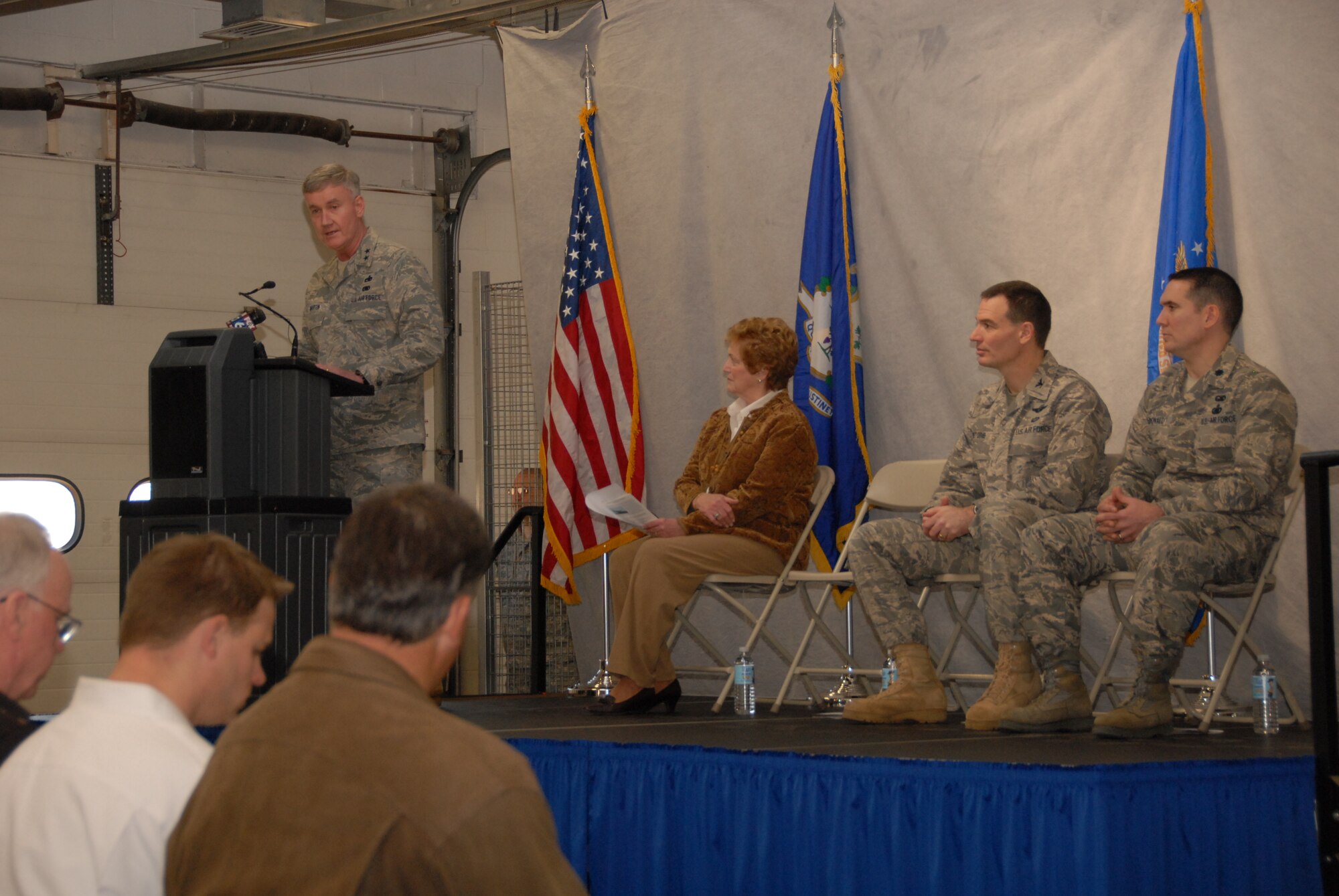 Maj. Gen Thaddeus J. Martin, the adjutant general for the state of Connecticut, addresses guests and members of the 103rd Airlift Wing during a groundbreaking for the Centralized Intermediate Repair Facility at Bradley Air National Guard base in East Granby, Conn. March 6, 2010. Behind the general sits, from left, Connecticut Governor  M. Jodi Rell, Col. Frank N. Detorie, commander of the 103rd Airlift Wing, and Lt. Col. Jerry McDonald, commander,  103rd Maintenance Group. (U.S. Air Force photo by Tech. Sgt. Erin McNamara)