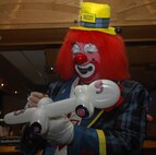 MINOT AIR FORCE BASE, N.D. -- A racecar takes shape as Dizzy fulfills requests by kids at the Jimmy Doolittle Center March 14. Dizzy appears at every Sunday brunch at J.R. Rockers for family night, along with many public appearances for the Shriners. (U.S. Air Force photo by Laurie Arellano)