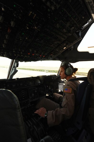 First Lt. Erica McCaslin, 816th Expeditionary Airlift Squadron pilot, taxis a C-17 Globemaster III in at a non-disclosed Southwest Asia location March 10, 2010. Lieutenant McCaslin was part of an all-female crew in honor of Women's History Month and is deployed from the 14th Airlift Squadron. (U.S. Air Force photo by Senior Airman Kasey Zickmund)