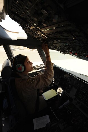 Capt. Angela Kimler, 816th Expeditionary Airlift Squadron pilot, conducts post-flight operations on a C-17 Globemaster III at a non-disclosed Southwest Asia location March 10, 2010. Captain Kimler was the aircraft commander during a flight with an all-female crew in honor of Women's History Month and is deployed from the 14th Airlift Squadron. (U.S. Air Force photo by Senior Airman Kasey Zickmund)