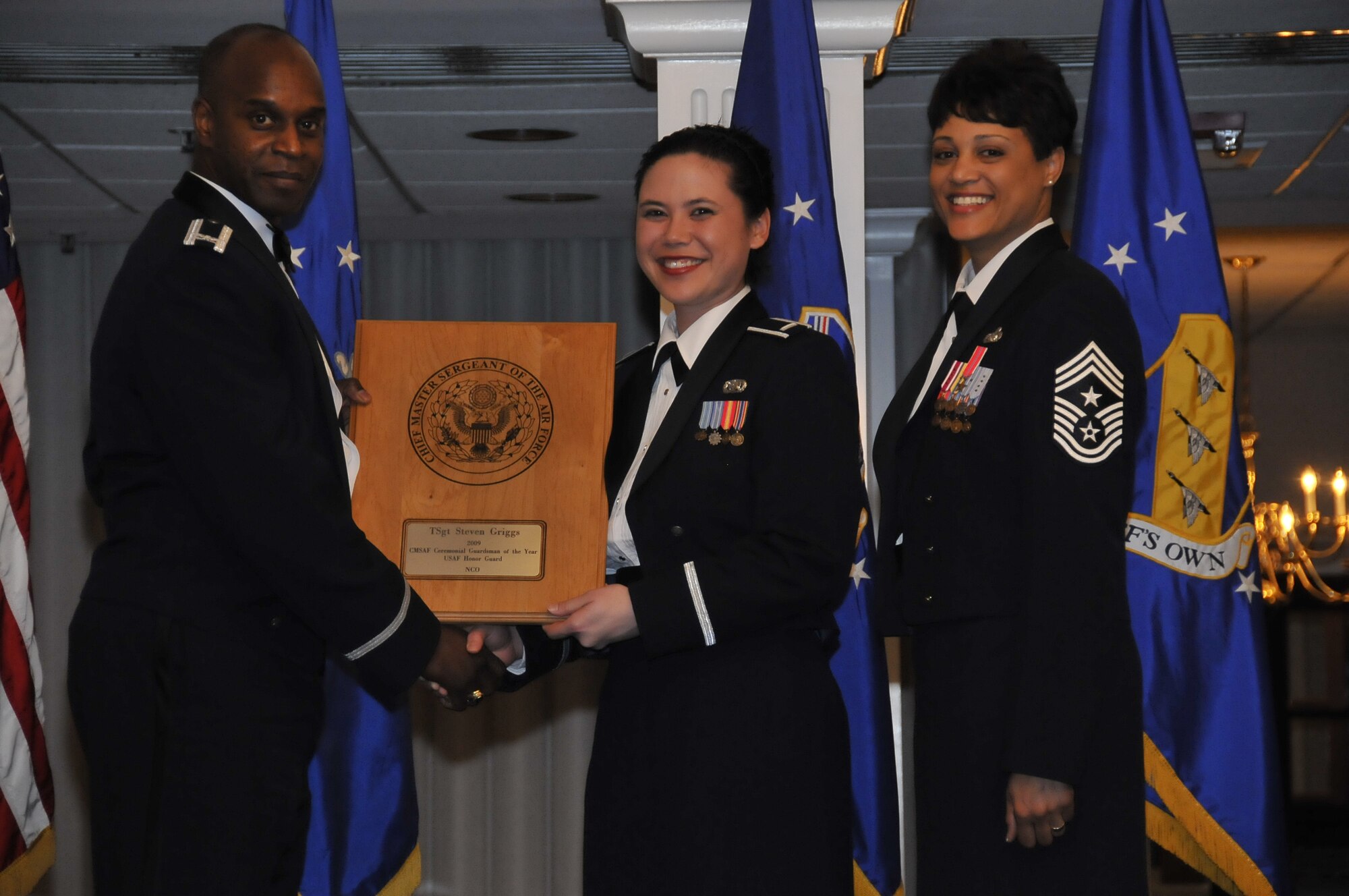 Chief Master Sergeant of the Air Force Ceremonial Guardsman of the Year: Tech Sgt Steven L. Griggs. First Lt. Tiffany Stone, U. S. Air Force Honor Guard, was on hand to receive the award on Sgt. Griggs' behalf March 12 at the 2010 11th Wing Annual Awards at the Bolling Club. (U.S. Air Force photo by Senior Airman Marleah Miller)