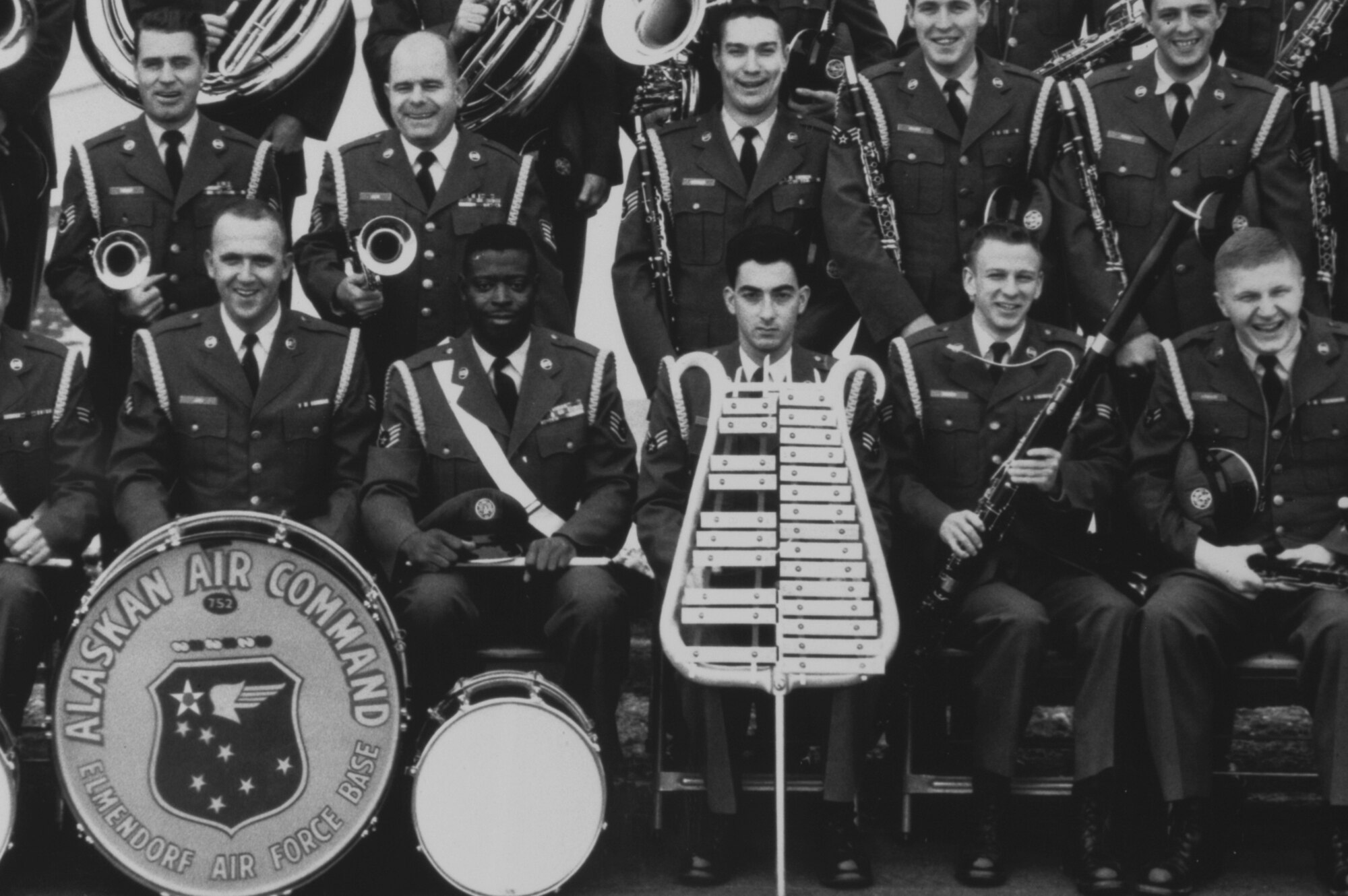 ELMENDORF AFB, Alaska -- Jazz fusion keyboardist Tom Coster was once a member of the USAF Band of the Pacific in the mid 1960's, when the band was known as the 752nd Alaskan Air Command Band.  Then-Sgt Coster is seen at center with the bell lyre in a photo dated October 1965.  After his time in the Air Force, Mr Coster went on to play with such noteable musicians as Carlos Santana, Steve Smith, Michael Brecker and host of others.  To this day he continues an active touring and recording schedule.  (Band of the Pacific archive photo)
