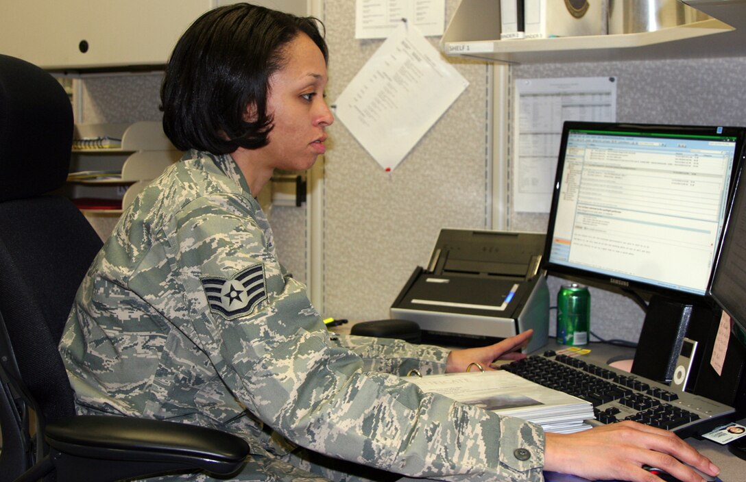 Staff Sgt. Tynesia Riley, 22nd Aircraft Maintenance Squadron/931st Operations Support Flight knowledge operations manager, scans the local area network and folders for personally identifiable information, Privacy Act and Freedom of Information Act violations. In addition to scanning the LAN, the Chicago native is responsible for the overall administration, management and life cycle of information and control of information resources at McConnell. (U.S. Air Force photo/Master Sgt. Brent Barr)