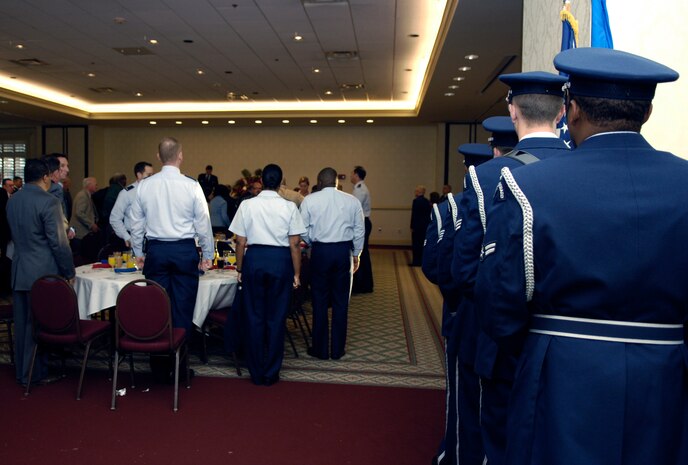 The base honor guard prepares to post the colors at the National Prayer Breakfast held in the Charleston Club March 15. Originally called the Presidential Prayer Breakfast, the name was changed to the National Prayer Breakfast in 1970. During the breakfast guest speakers prayed for the military, the nation and spoke about daily spiritual needs and how to lead fulfilling lives. (U.S. Air Force photo/Airman 1st Class Lauren Main)