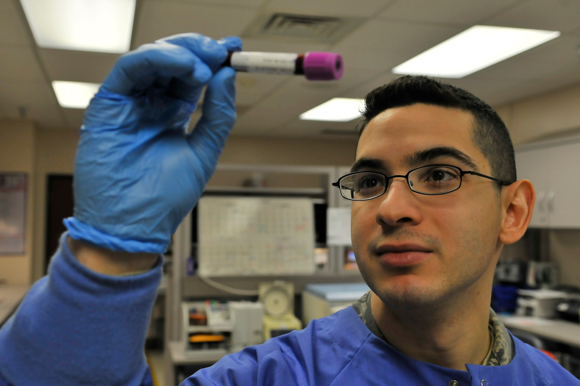 Senior Airman Michael Urena inspects a whole blood sample for clotting in the 354th Medical Group laboratory Mar. 11, 2010, Eielson Air Force Base, Alaska. Airman Urena is a medical laboratory technician assigned to the 354th MDG. (U.S. Air Force photo/Staff Sgt. Christopher Boitz)