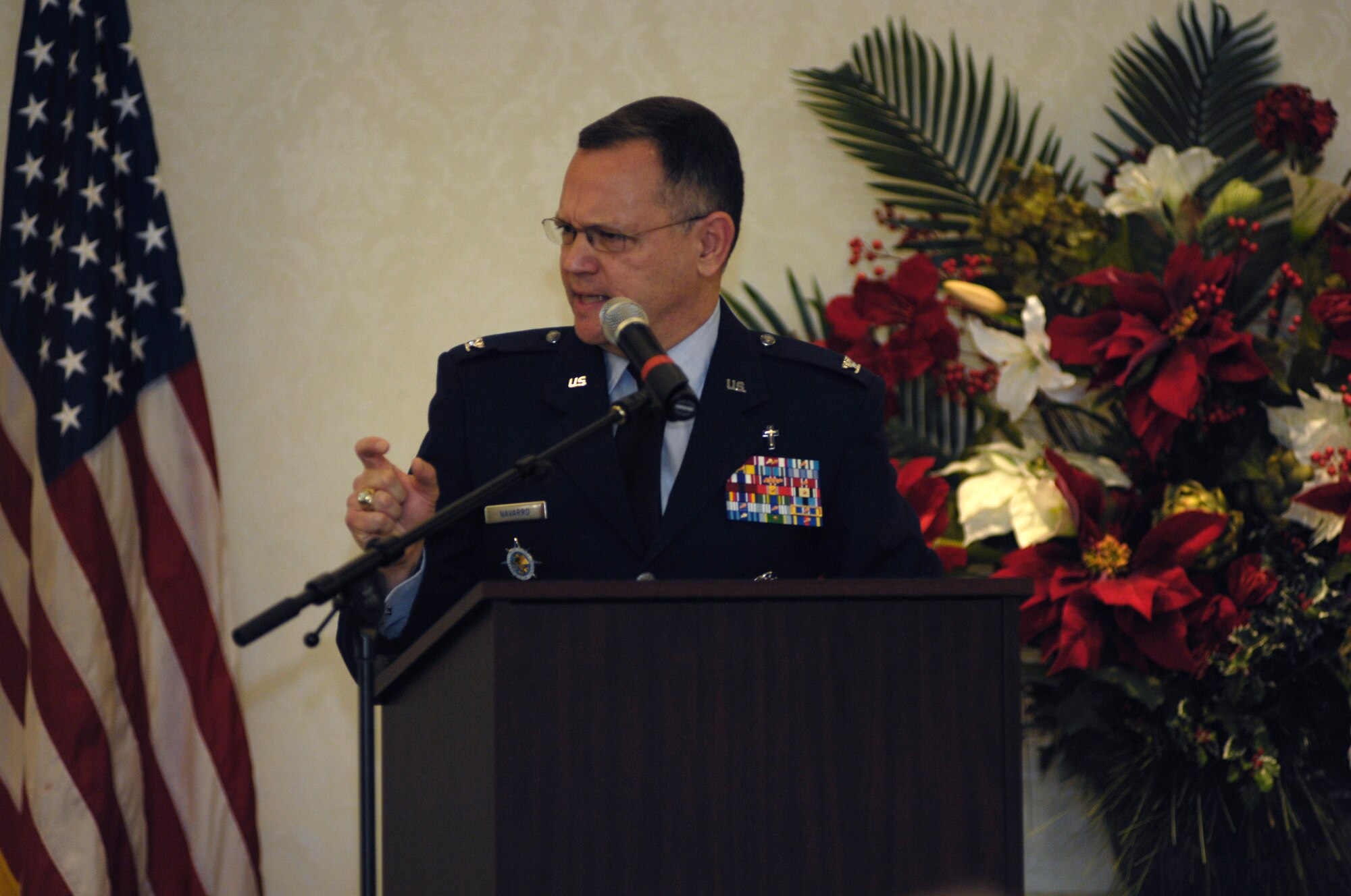 Chaplain (Col.) Conrado Navarro speaks to members of Team Charleston during the National Prayer Breakfast at the Charleston Club March 15. During his speech, Colonel Navarro spoke about finding a purpose regardless of whether or not the conditions are favorable. Although a Cuban native, he migrated with his family to the U.S. when he was seven years old. Now, he sustains the operational capabilities of the Chaplain Corps to ensure a fully mission-capable force committed to delivering world class ministry through the Chaplain Corps. Colonel Navarro is the command chaplain for U.S. Transportation Command and Air Mobility Command. (U.S. Air Force photo/Airman 1st Class Lauren Main)