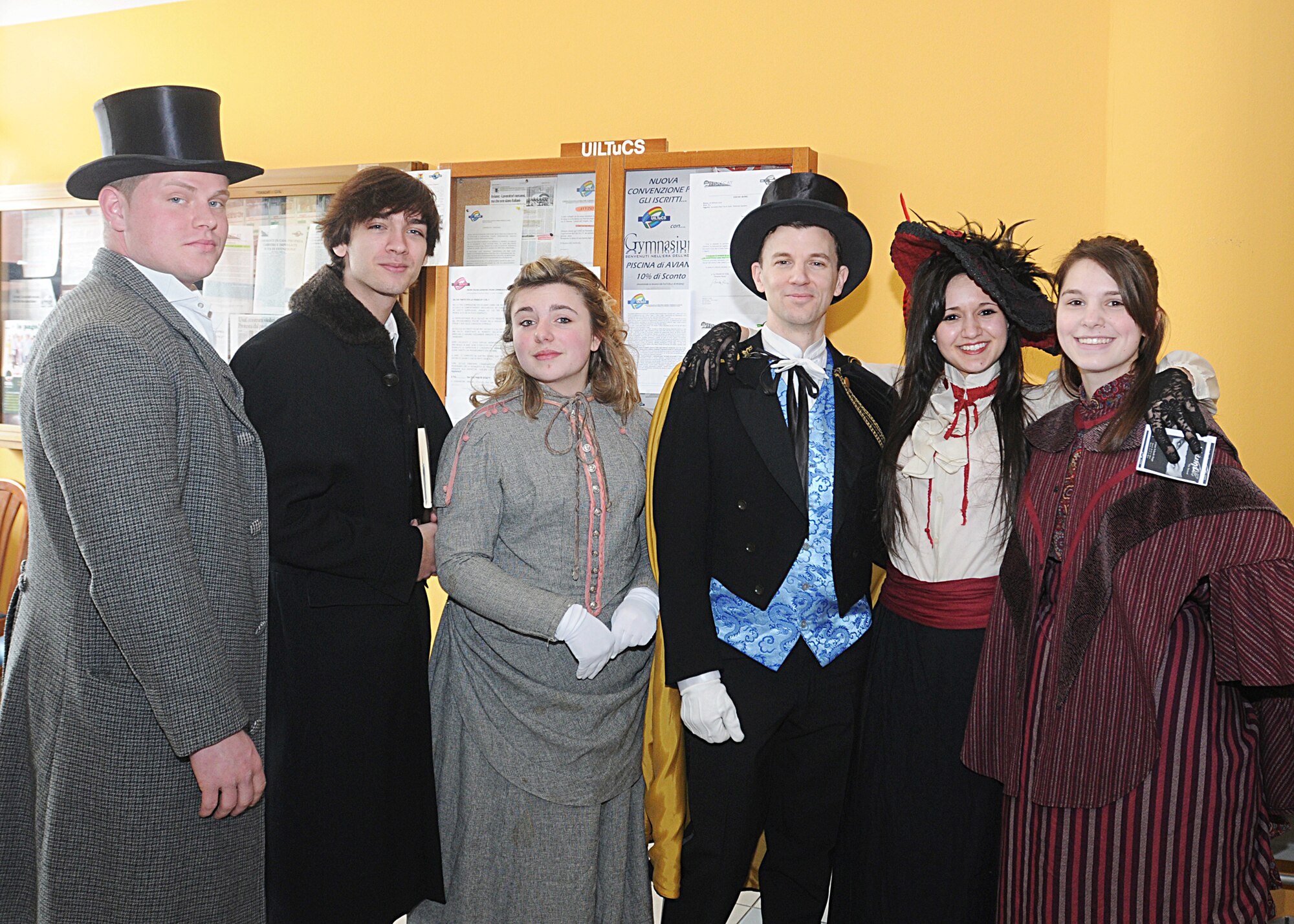 Members of the Aviano Community Theater pose for a picture March 15 at the Italian Mensa before performing a teaser of the upcoming musical, "Dr. Jekyll and Mr. Hyde."  The show will run March 18 to 20 and 25 to 27, and begins at 8 p.m. Tickets are sold at the door and are $5 for E-4 and below or equivalent and $10 for anyone else.  (U.S. Air Force photo/Senior Airman Tabitha M. Mans)