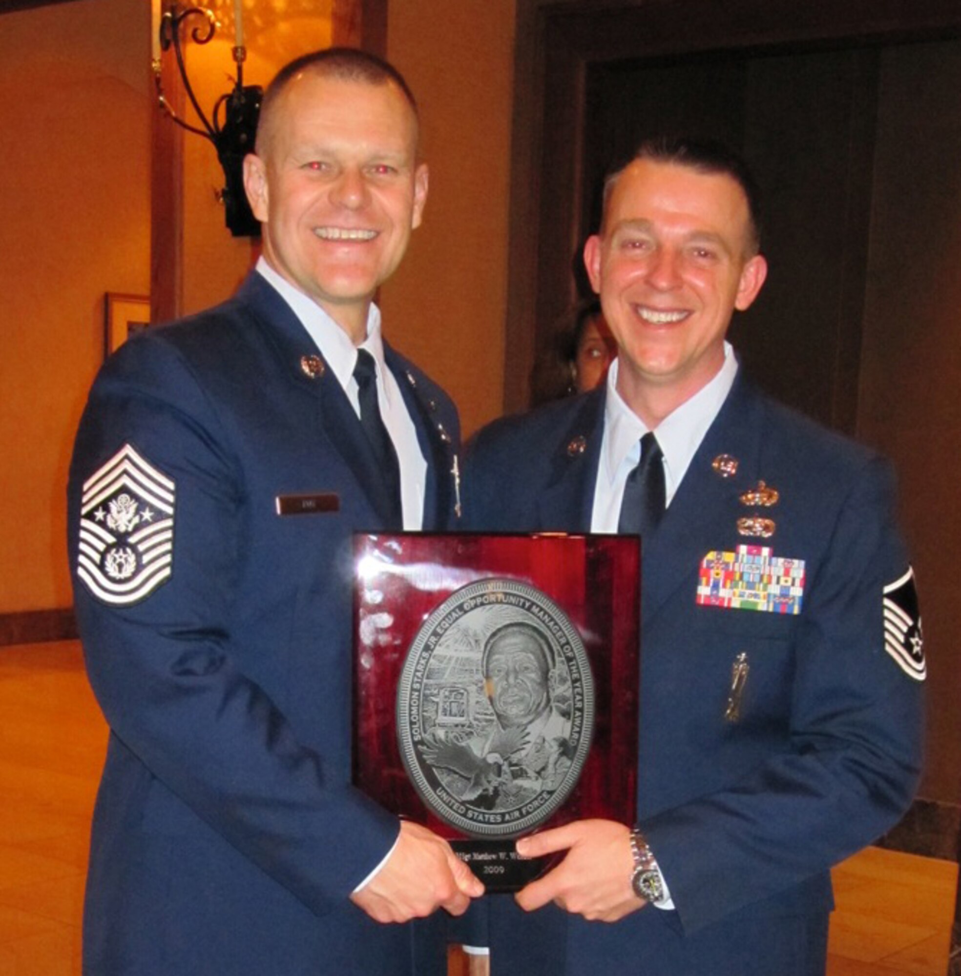 Chief Master Sgt. of the Air Force James A. Roy presents Master Sgt. Matthew Wendel, 501st Combat Support Wing Equal Opportunity, with the Air Force EO Director of the Year award March 11 at the A1 Worldwide Conference in San Antonio. (Courtesy Photo)
