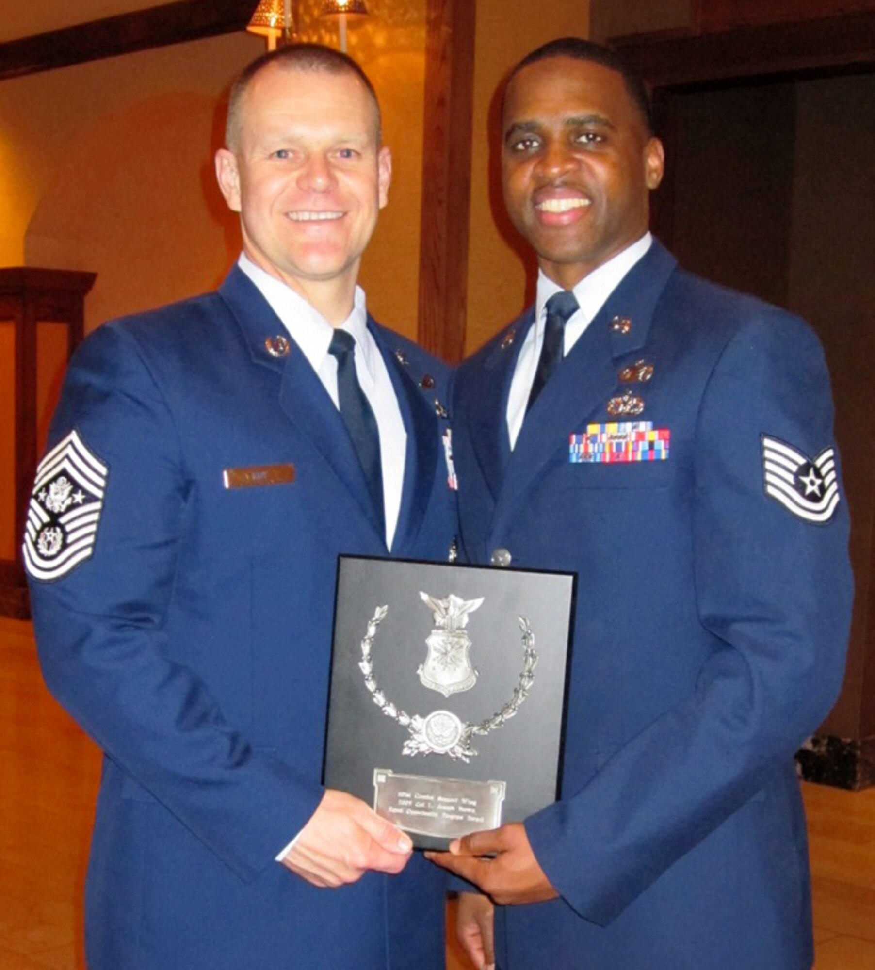 Chief Master Sgt. of the Air Force James A. Roy presents Tech. Sgt. Darius Kersh, 501st Combat Support Wing Equal Opportunity, with the Air Force EO Office of the Year award March 11 at the A1 Worldwide Conference in San Antonio. (Courtesy Photo)