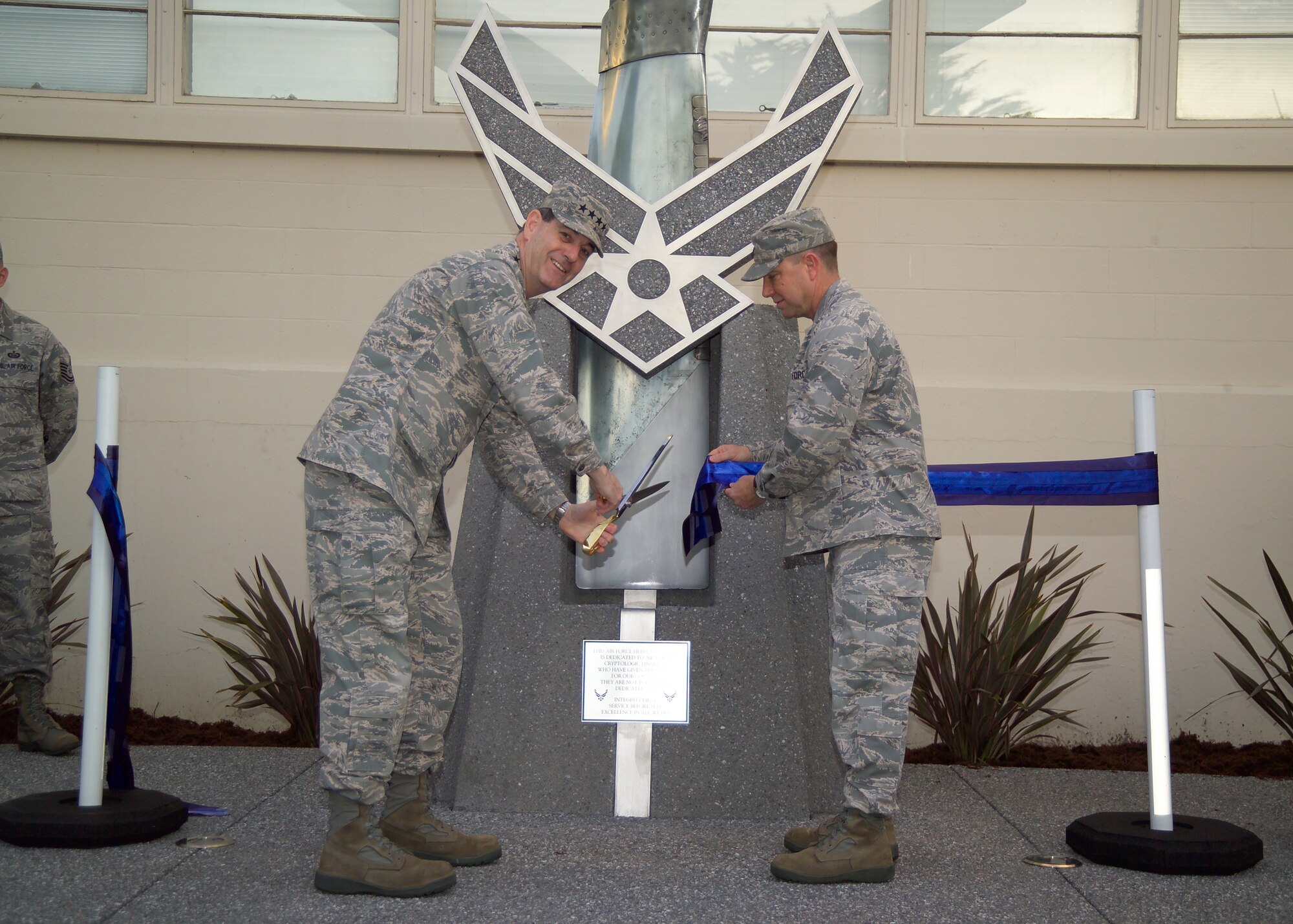 Gen. Stephen Lorenz, Air Education and Training Command commander and Col.Terry Bare, 517th Training Group commander, cut the ribbon to dedicate the Presidio of Monterey’s new Airman Heritage Exhibit. The exhibit was designed as a tribute to Air Force cryptologic linguists who have fallen in the line of duty, spanning from 1953 over the Sea of Japan through the most recent in 2005 in Albania. (U.S. Air Force photo)