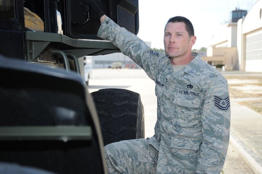 Tech. Sgt. Ed Wilkerson 53rd Aerial Port Squadron, Pope Air Force Base N.C., was first on the scene to an aircraft crash while deployed in Afghanistan. Sergeant Wilkerson witnessed the pilot and navigator eject from a RAF GR4 Tornado and without regard to his well being, assisted in moving the crew to saftey. (U.S. Air Force Photo/submitted by Jerry Green) 