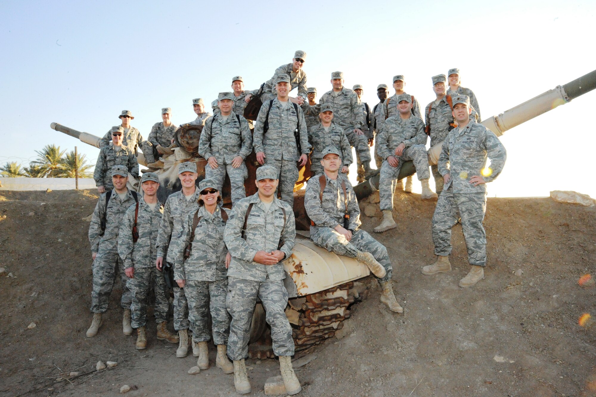 CAMP VICTORY, Iraq -- Senior Airman Jarrod Chavana (front, center) is deployed as a journalist with the Baghdad News media team. Chavana will return to his home unit, 633d Air Base Wing Public Affairs, in June. (Courtesy photo)