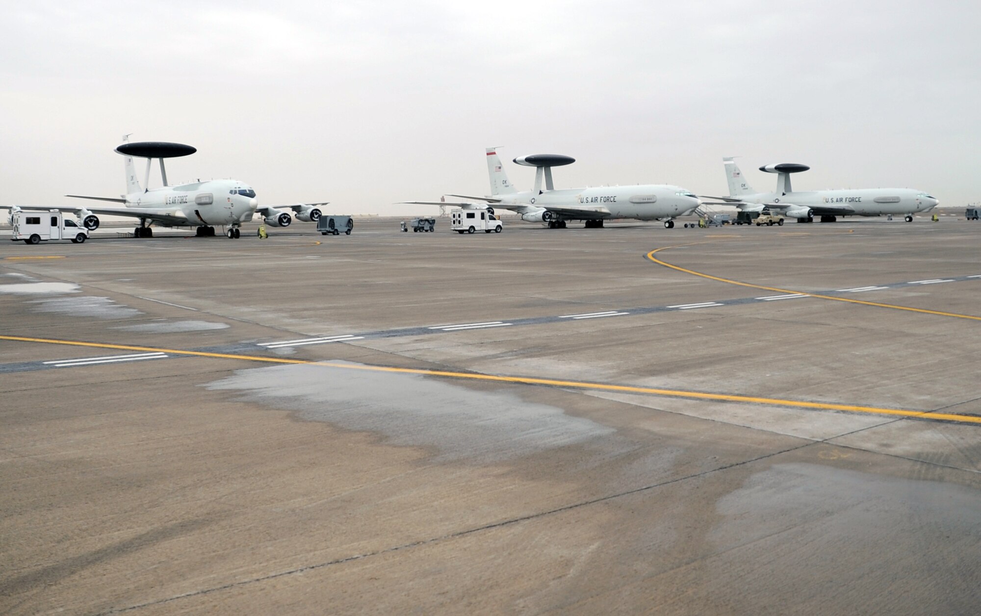 E-3 Sentry Airborne Warning and Control System aircraft are parked on the flightline of the 380th Air Expeditionary Wing at a non-disclosed base in Southwest Asia on March 2, 2010. The E-3 Sentrys are assigned to the 965th Expeditionary Airborne Air Control Squadron. The 965th EAACS, as part of the 380th Air Expeditionary Wing, support operations Iraqi Freedom and Enduring Freedom and the Combined Joint Task Force-Horn of Africa. (U.S. Air Force Photo/Master Sgt. Scott T. Sturkol/Released) 