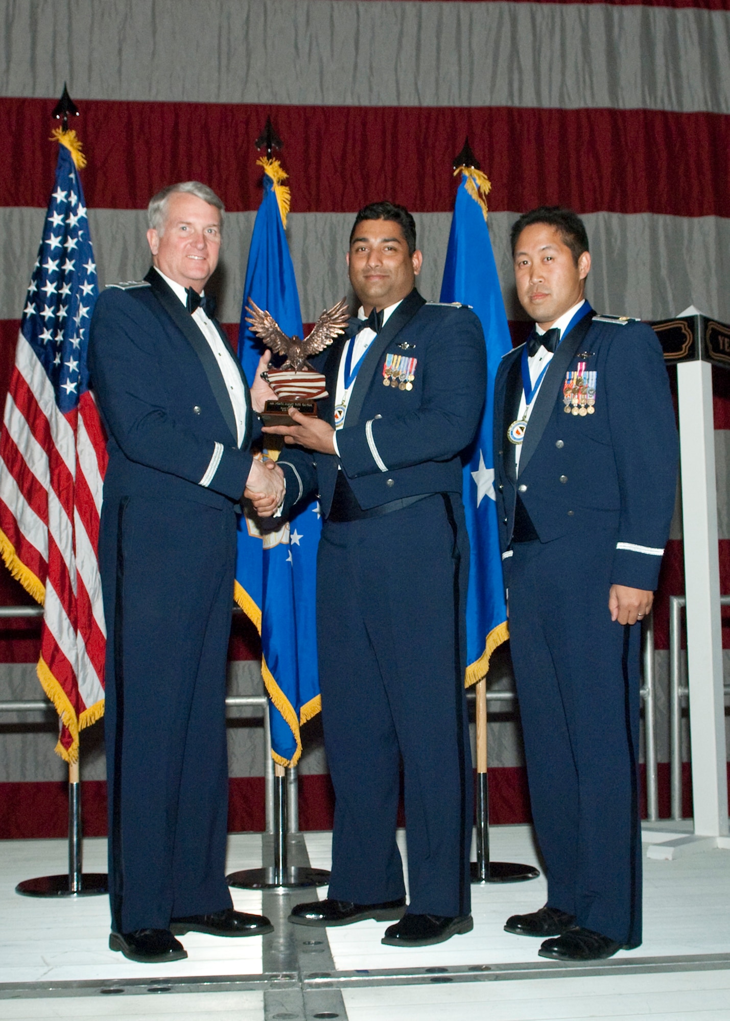 Members of the 418th Flight Test Squadron B-52 Test Team, receive the Team of the Year Award during the Air Force Flight Test Center Annual Awards ceremony March 12. (Air Force photo/Mike Yncera)