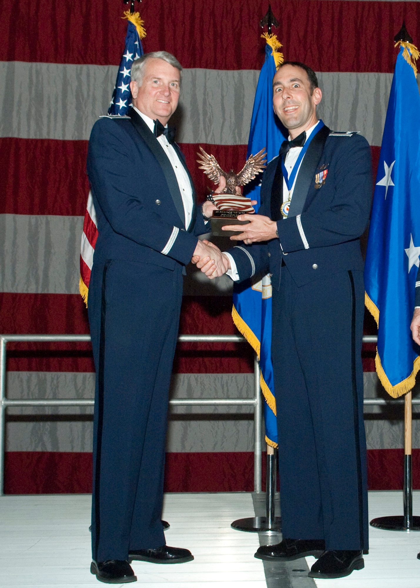 Lt. Col. Walter L. Jablow, Air Force Flight Test Center Saftey Office, receives the Officer Individual Mobilization Augmentee of the Year Award during the Air Force Flight Test Center Annual Awards ceremony March 12. (Air Force photo/Mike Yncera)