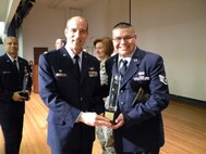 Airman of the Year Staff. Sgt Marcos Palacios recieves his award the 940th Wing Commander, Col. Sal MIneo during the Match UTA Commander's Call.