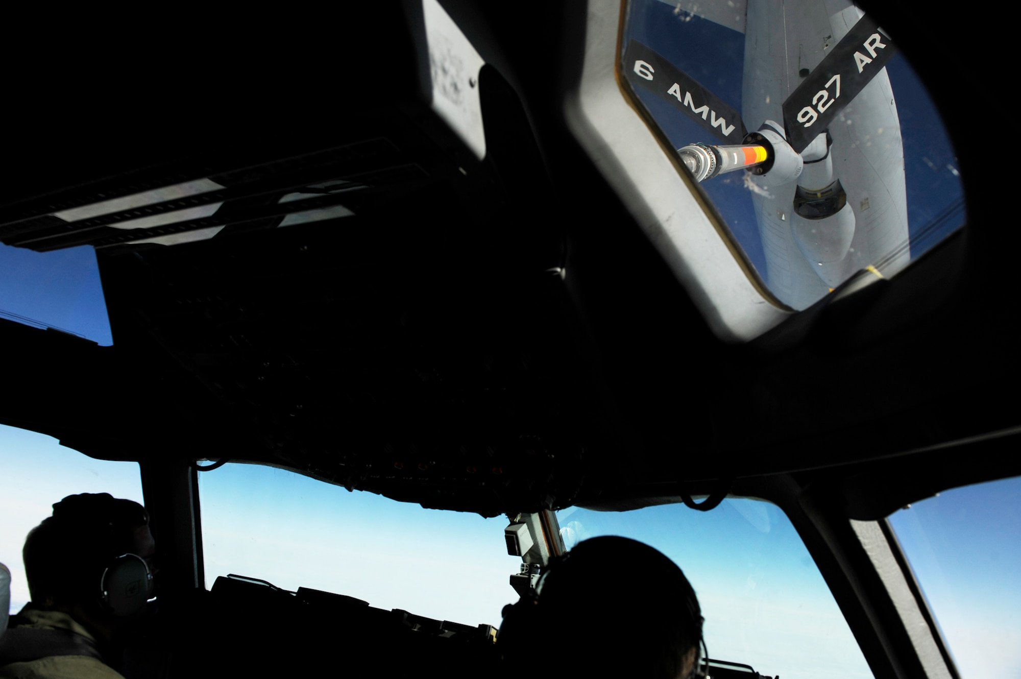 Lt. Col. Brian Loehrke maneuvers a C-17 Globemaster III into position under a KC-135 Stratotanker during an air refueling mission near MacDill Air Force Base, Fla., March 12, 2010.  Colonel Loehrke is from the 300th Airlift Squadron at Charleston AFB, S.C. (U.S. Air Force photo/Staff Sgt. Eric Harris)