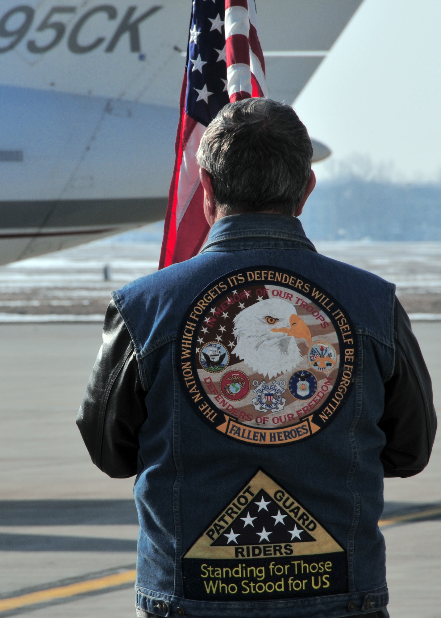 Patriot Guard Riders pay tribute to a fallen American Soldier, March 11, 2010, Niagara Falls, NY. When invited by the family of the deceased, Patriot Guard Riders show their support by attending the ceremonies of fallen patriots. (U.S. Air Force photo by Staff Sgt. Joseph McKee)