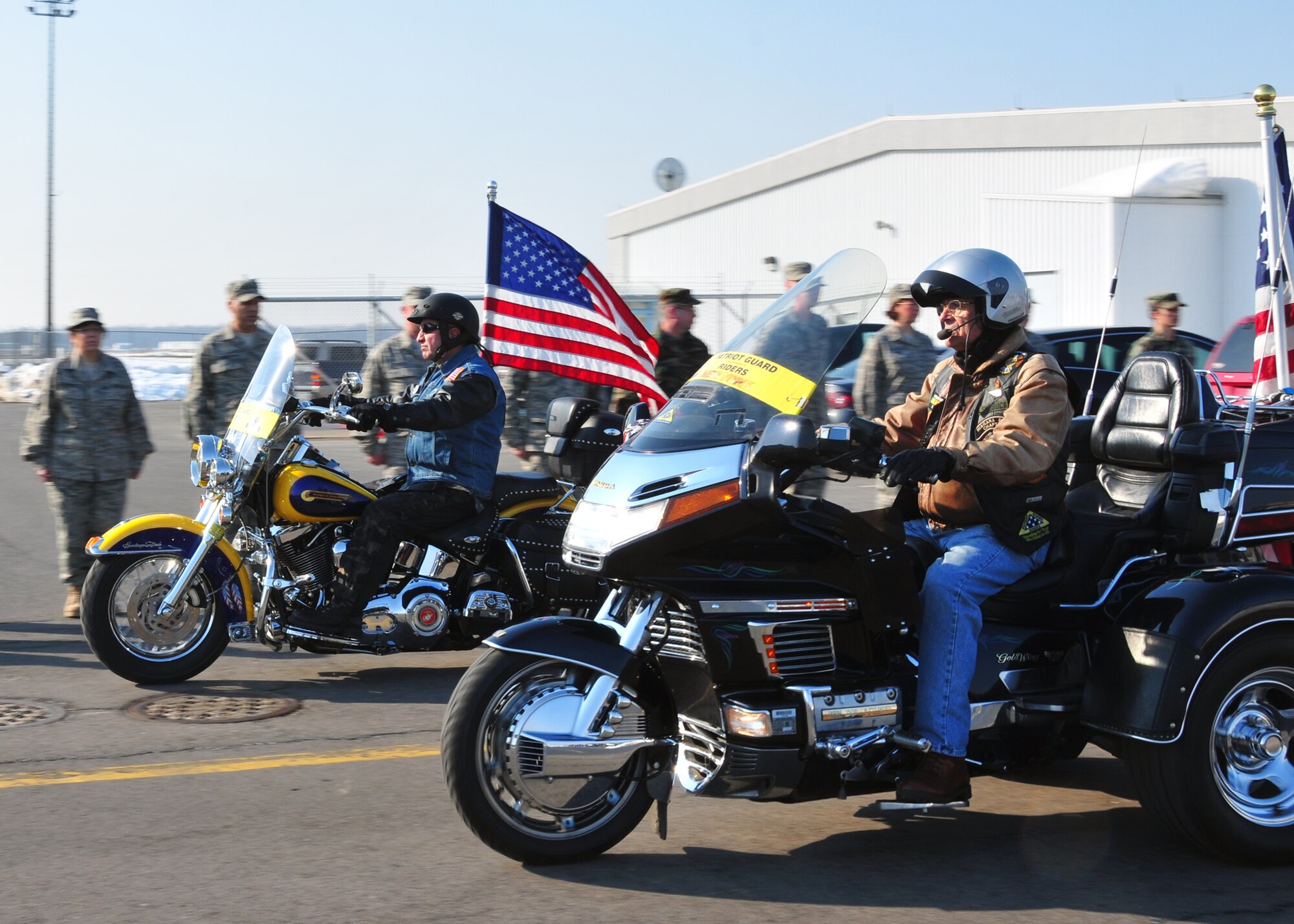Patriot Guard Riders pay tribute to a fallen American Soldier, March 11, 2010, Niagara Falls, NY. When invited by the family of the deceased, Patriot Guard Riders show their support by attending the ceremonies of fallen patriots. (U.S. Air Force photo by Staff Sgt. Joseph McKee)