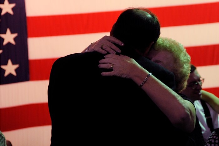 Attendees of the World War II Hanger Dance on the USS Yorktown in Mount Pleasant, S.C., dance the night away in honor of World War II veterans March 13, 2010. All proceeds from the event go toward the Honor Flight program. The flights leave from various cities around the United States and take World War II veterans to Washington D.C. for a day of sightseeing, remembering and honoring among its numerous memorials. (U.S. Air Force photo by Airman 1st Class Alexandra Hoachlander)(Released)