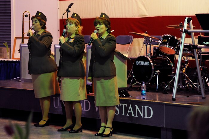 The group Vintage Vocals sings at the World War II Hanger Dance on the USS Yorktown in Mount Pleasant, S.C., in honor of World War II veterans March 13, 2010. The 1940s style Hangar Dance was held as a fundraiser which will donate 100 percent of the profits to the upcoming Honor Flight scheduled to leave Charleston this spring to make it possible for World War II veterans to go to Washington D.C. and see the numerous memorials. (U.S. Air Force photo by Airman 1st Class Alexandra Hoachlander)(Released)