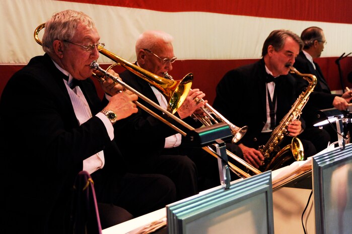 Members of the Nancy Clayton Band play at the World War II Hanger Dance on the USS Yorktown in Mount Pleasant, S.C., in honor of World War II veterans March 13, 2010. The 1940s style Hangar Dance was held as a fundraiser which will donate 100 percent of the profits to the upcoming Honor Flight scheduled to leave Charleston this spring. The first Honor Flight Lowcountry trip from Charleston took place Nov. 7, 2009, with an outpouring of support from the Charleston community. (U.S. Air Force photo by Airman 1st Class Alexandra Hoachlander)(Released)