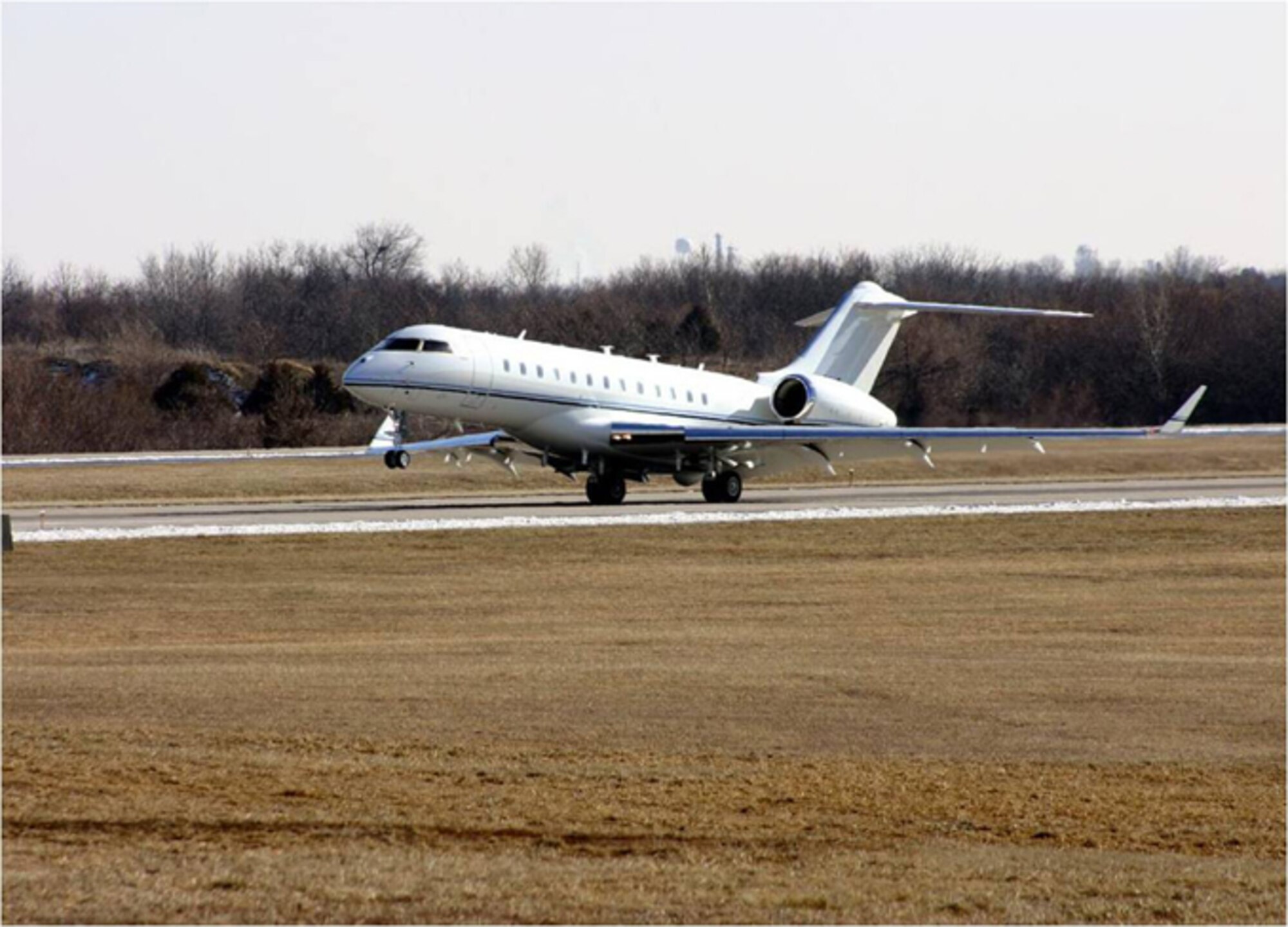 A BD-700 equipped with the full suite of Battlefield Airborne Communication Node (BACN) equipment takes off from Wichita Airport in Kansas earlier this month.  The Electronic Systems Center’s BACN Joint Urgent Operational Need team received one of two John J. Welch, Jr. Awards for Excellence in Acquisition Leadership March 10.  Col. Cordell DeLaPena, 653rd Electronic Systems Group commander, was also named an Air Force Outstanding System Program Director.  (Courtesy Photo)