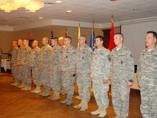 Members of the 139th Security Forces Squadron stand in formation at an awards ceremony where Gov. Jay Nixon presented various medals in Branson, Mo., Jan. 30. (U.S. Air Force photo by Civ. Jane Lackey/Released)