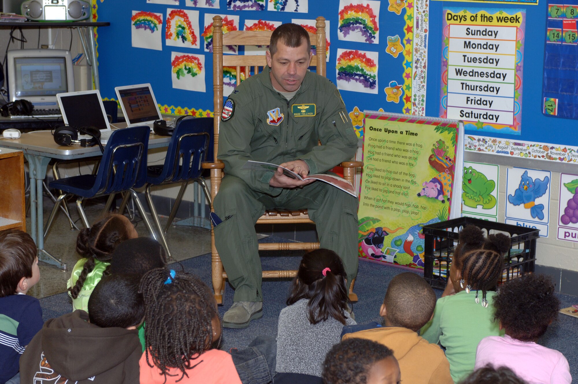 HAMPTON, Va. – Col. Wade Tolliver, 1st Fighter Wing vice commander, reads "A Color of His Own" by Leo Lionni to Mrs. Wescott and Mrs. Odom’s class at Machen Elementary School March 17. Tolliver and several Langley Airmen often support the Mayor’s Book Club by reading to local area elementary school students. (U.S. Air Force photo/Staff Sgt. Heidi Davis)